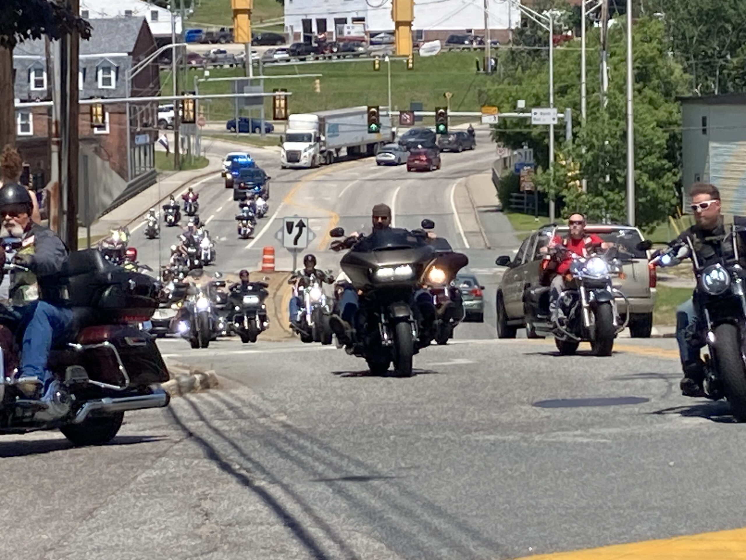 Motorcyclists escorting the Wall that Heals into town