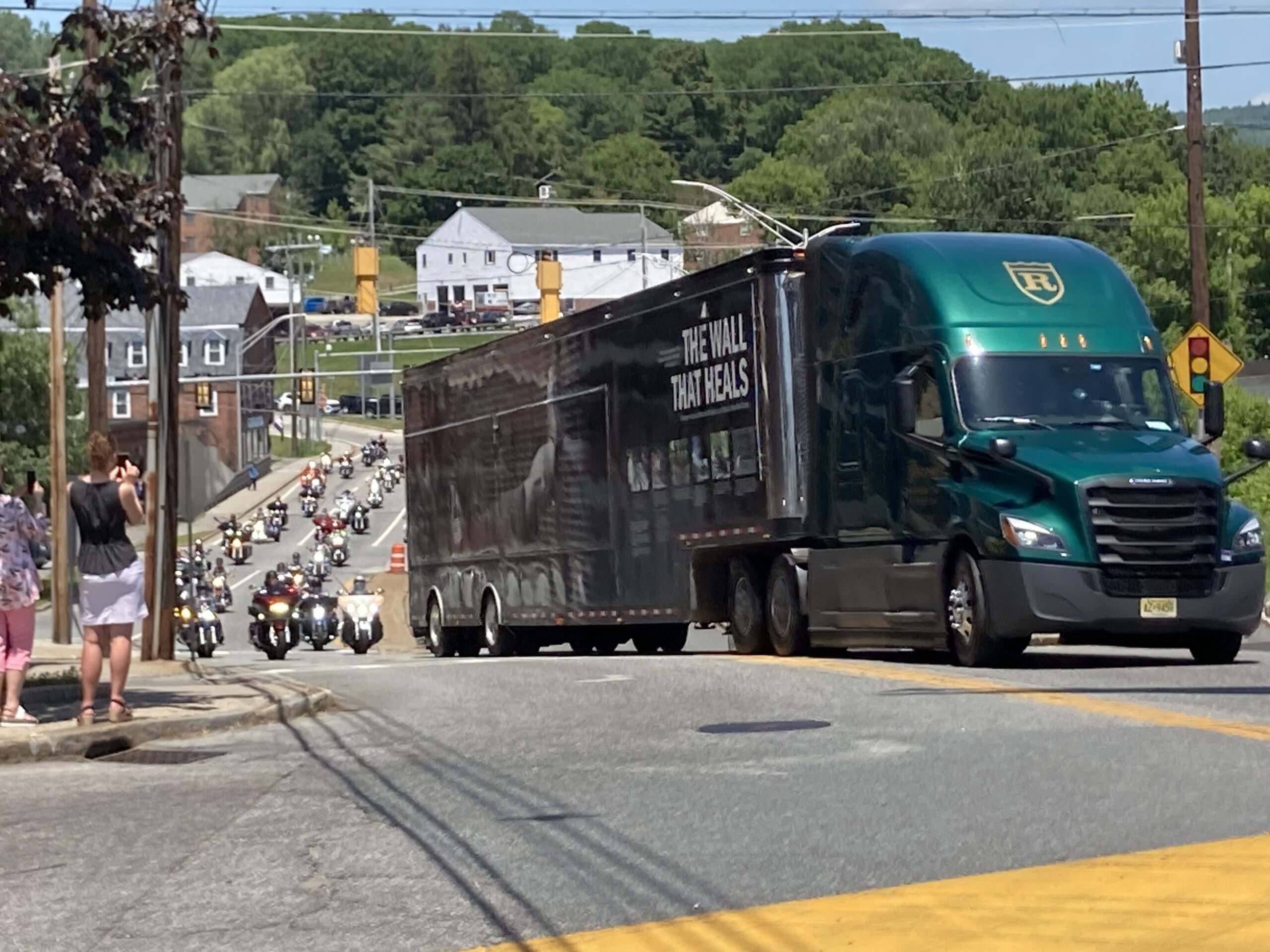 The trailer truck containing the Wall that Heals plus a mobile museum arrives in Claremont