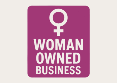 Female symbol with text Woman owned business